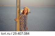 happy smiling girl enjoying sun, dancing and laughs, calls for you with gesture. Стоковое видео, видеограф Ирина Мойсеева / Фотобанк Лори