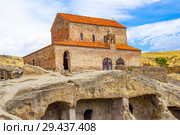 Beautuful View to Ancient Orthodox Church in mount in antique cave city Uplistsikhe. The Uplistsikhe 9th-10th century three-nave basilica and vale of Mtkvari river, Shida Kartli, Gori, Georgia. Стоковое фото, фотограф Алексей Ширманов / Фотобанк Лори