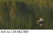 Рыбак. Рыбалка с лодки. Fisherman on the river. Fishing from a boat. Стоковое видео, видеограф Евгений Романов / Фотобанк Лори