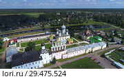 Тихвинский Богородичный Успенский монастырь июльским  днем (съемка с квадрокоптера). Тихвин, Россия (2018 год). Стоковое видео, видеограф Виктор Карасев / Фотобанк Лори