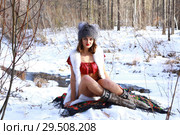 Молодая красивая девушка в красном купальнике на снегу. Стоковое фото, фотограф Валерий Митяшов / Фотобанк Лори
