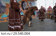 Women dancing in national clothing indigenous inhabitants Kamchatka (2018 год). Редакционное видео, видеограф А. А. Пирагис / Фотобанк Лори