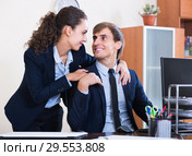 Top manager flirting with subordinate official at workplace. Стоковое фото, фотограф Яков Филимонов / Фотобанк Лори