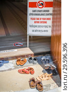 Shoes before entering Lala Mustafa Pasha Mosque (2018 год). Редакционное фото, фотограф katalinks / Фотобанк Лори