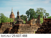 Руины буддийского храма в Сукхотхаи, фигура Будды. Таиланд. Стоковое фото, фотограф Александр Романов / Фотобанк Лори