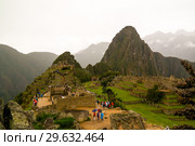 Panoramic view to Machu Picchu archaeological site and Huayna Picchu mountain , Cuzco, Peru (2018 год). Редакционное фото, фотограф Сергей Майоров / Фотобанк Лори