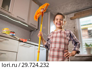 girl mops the floor at home. Стоковое фото, фотограф Типляшина Евгения / Фотобанк Лори