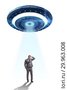 Flying saucer abducting young businessman. Стоковое фото, фотограф Elnur / Фотобанк Лори