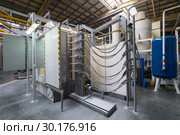 Powder coating line. Camera painting products in an electrostatic field. Стоковое фото, фотограф Андрей Радченко / Фотобанк Лори