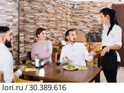 Portrait of waitress and unhappy people in a cafe. Стоковое фото, фотограф Яков Филимонов / Фотобанк Лори