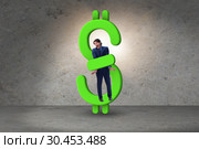 Businessman in dollar and debt concept. Стоковое фото, фотограф Elnur / Фотобанк Лори