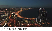View from drone of illuminated Barceloneta beach with Port Vell t night (2019 год). Стоковое видео, видеограф Яков Филимонов / Фотобанк Лори