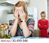 Frustrated woman scolding little daughter. Стоковое фото, фотограф Яков Филимонов / Фотобанк Лори