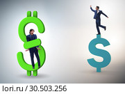 Businessman in dollar and debt concept. Стоковое фото, фотограф Elnur / Фотобанк Лори