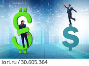 Businessman in dollar and debt concept. Стоковое фото, фотограф Elnur / Фотобанк Лори