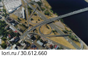 Tiltshift Road cars Traffic Bridge drone Timelapse Viaduct in Riga city Miniature in motion. Стоковое видео, видеограф Aleksejs Bergmanis / Фотобанк Лори
