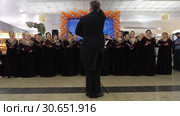Vocal performance of Russian choir at Moscow airport (2017 год). Редакционное видео, видеограф Данил Руденко / Фотобанк Лори