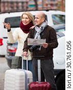 Spouses with baggage and map. Стоковое фото, фотограф Яков Филимонов / Фотобанк Лори