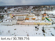 Тихвинский Богородичный Успенский монастырь крупным планом облачным мартовским днем (аэрофотосъемка). Тихвин, Россия (2019 год). Стоковое фото, фотограф Виктор Карасев / Фотобанк Лори