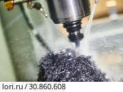Milling machine work in metalwork industry. CNC processing detail with lubrication and coolant. Стоковое фото, фотограф Дмитрий Калиновский / Фотобанк Лори