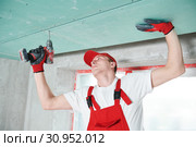 gypsum suspended ceiling construction work. Стоковое фото, фотограф Дмитрий Калиновский / Фотобанк Лори