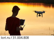 drone flying. copter pilotage at river sunset. Стоковое фото, фотограф Дмитрий Калиновский / Фотобанк Лори
