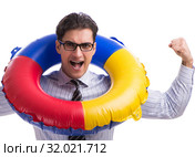 Young businessman with life buoy isolated on white background. Стоковое фото, фотограф Elnur / Фотобанк Лори