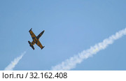29 AUGUST 2019 MOSCOW, RUSSIA: Two blue and yellow reactive planes flying in the sky and performing a show with releasing the smoke. Редакционное видео, видеограф Константин Шишкин / Фотобанк Лори