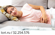 Woman suffering from abdominal pain. Стоковое фото, фотограф Яков Филимонов / Фотобанк Лори