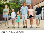 ﻿family walking in summer city. Стоковое фото, фотограф Яков Филимонов / Фотобанк Лори