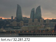 Пламенные башни над современным Баку сумрачным январским вечером. Азербайджан (2018 год). Стоковое фото, фотограф Виктор Карасев / Фотобанк Лори