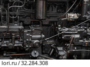Крупным планом двигатель гусеничного трактора Т-74 (2019 год). Редакционное фото, фотограф Николай Винокуров / Фотобанк Лори
