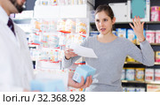 woman client who is dissatisfied of recommended medicines. Стоковое фото, фотограф Яков Филимонов / Фотобанк Лори