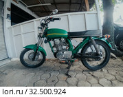 Motorbike, scooter, traditional two wheels transport in Asia. Стоковое фото, фотограф Aleksejs Bergmanis / Фотобанк Лори