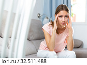 Tired girl with headache. Стоковое фото, фотограф Яков Филимонов / Фотобанк Лори