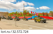Russia, Samara, May 2017: the army special armored vehicle "Tiger" and the military modified main battle tank T-72B3M on Kuybyshev Square on Victory Day on a spring sunny day. Редакционное фото, фотограф Акиньшин Владимир / Фотобанк Лори
