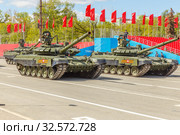 Russia, Samara, May 2017: the military modified main battle tank T-72B3M on Kuybyshev Square on Victory Day on a spring sunny day. Редакционное фото, фотограф Акиньшин Владимир / Фотобанк Лори