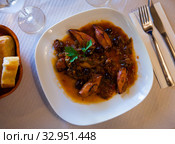 Appetizing stewed squids. Стоковое фото, фотограф Яков Филимонов / Фотобанк Лори