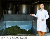 Female winemaker in winery. Стоковое фото, фотограф Яков Филимонов / Фотобанк Лори