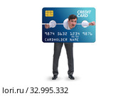Businessman in credit card burden concept in pillory. Стоковое фото, фотограф Elnur / Фотобанк Лори