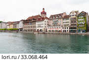 Cityscape of Lucerne with old Town Hall clock (2017 год). Редакционное фото, фотограф EugeneSergeev / Фотобанк Лори