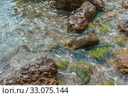 Pure clear water on a wild stone beach in the sea (2016 год). Стоковое фото, фотограф katalinks / Фотобанк Лори