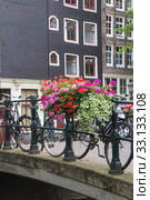 Bridge over canal in Amsterdam. Стоковое фото, фотограф Jaroslav Frank / PantherMedia / Фотобанк Лори