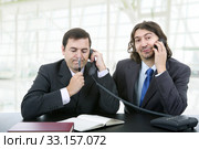 business team working at a desk at the office. Стоковое фото, фотограф Rui Vale de Sousa / Smarterpix / Фотобанк Лори