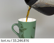 Coffey Pouring in to Cup. Стоковое фото, фотограф Niklas Emmoth / PantherMedia / Фотобанк Лори