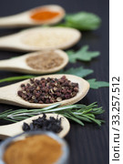Colorful spices and wooden cutlery. Стоковое фото, фотограф Erika Eros / PantherMedia / Фотобанк Лори