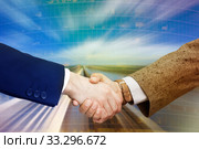 Handshake confirming business partnership. Стоковое фото, фотограф Яков Филимонов / Фотобанк Лори