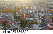 Aerial view of Sumperk cityscape overlooking Town hall and Saint John Baptist church on autumn day, Czech Republic (2019 год). Стоковое видео, видеограф Яков Филимонов / Фотобанк Лори