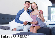 Family couple in furniture store. Стоковое фото, фотограф Яков Филимонов / Фотобанк Лори
