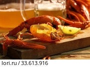 Crayfish with beer on a wooden table. Стоковое фото, фотограф Марина Володько / Фотобанк Лори